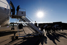 UNL Choir boards the plane for their trip. Inauguration choir trip. January 17, 2025. 