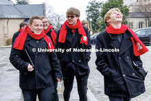 Joseph Hayman, from left, Chris Dickson, and Wyatt Felzien laugh as they walk outside the National C