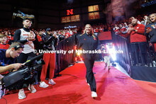 Nebraska volleyball’s new head coach Dani Busboom Kelly walks onto the court to be introduced to f