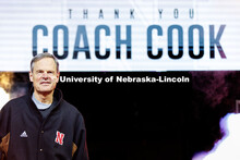 Former Nebraska volleyball head coach John Cook walks onto the court during a media timeout in Nebra