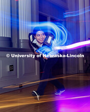 Students play a game of laser tag inside the Centennial Room of the Nebraska Union. Laser Tag and Ka