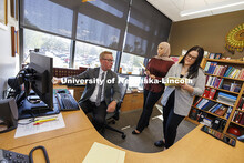 Professor Kevin Ruser meets with law students in the Immigration Clinic. College of Law Clinics. Sep
