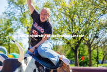 Sophomore, Claire Gangwish, rides a mechanical bull during the End of Year Bash on East Campus. May 