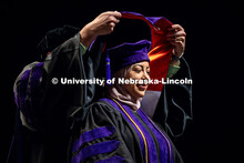 Fatima Al-Haidari receives her hood at the 2025 College of Law commencement in the Lied Center. May 