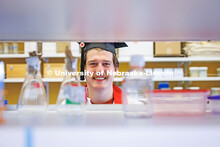 Kai Waddell photographed in a lab in the Morrison Life Sciences Building on East Campus. Waddell is 