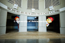 (Left) Brady Moylan as Herbie and Ben Hastreiter as ‘Lil Red peeks behind a column in Memorial Sta