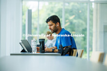 Sushil Sapkota, an Agricultural Economics, studies for finals in the Dinsdale Family Learning Common