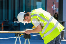 Carson Palmer, a sophomore Architectural Studies major, drills into a piece of wood during the shed 