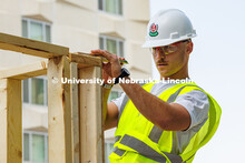 Senior Construction Management major, Joe Kearney, works on the frame of his group’s shed for the 