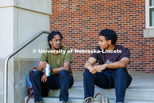 (Left) Senior, Mohamed Elimam, and Junior, Sayid Alsayid, sit outside the City Campus Union having a