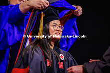 Mei Grace Behrendt receives her Doctor of Educational Psychology hood. 2025 Spring Graduate Commence