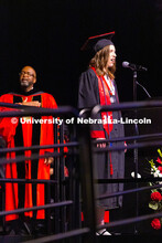 Annie von Kampen sings the National Anthem during the afternoon commencement ceremony at Pinnacle Ba