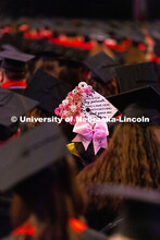 Teresa-Linh Tran-Le's cap reads "this is for my parents, who came here with nothing and gave me ever