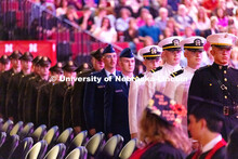 ROTC students line up before marching to the stage in Pinnacle Bank Arena to recite their oath of of