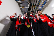 Charlotte Brockman (right) turned to Marcus Cureton (second from right) with a handful of her former