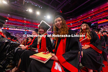 Veanne Yin Lum Kaw and Audrey Krieger smile during the morning commencement ceremony at Pinnacle Ban