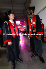 Computer Science graduates Matthew Donsig (l) and Abdelrahman Abdelazim Elhaj chat before the Univer