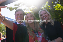 Emma Simpton takes a selfie with her parents outside of Pinnacle Bank Arena. Simpton's family came f