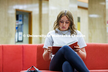 Madison Haring, a freshman Business Administration major, studies in Love Library South. April 07, 2