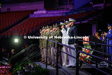Graduating seniors of the ROTC stand on stage to be commissioned into the military post-graduation. 