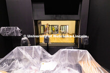 Contractors install sliding doors on soundproofed, private recording booths in the new Hixson-Lied C