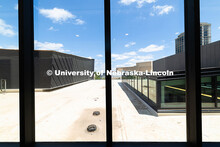 Large windows on the second floor of the new Hixson-Lied College of Fine and Performing Arts music b