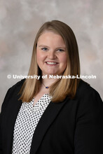 Studio portrait of Paige Kristensen, Assistant Director of Development at the University of Nebraska