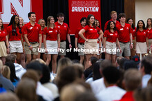 Dani Gibson strikes a pose while being introduced during the welcome session of New Student Enrollme
