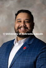 Studio portrait of Sergio Ceja, Assistant Director of Development at the University of Nebraska Foun