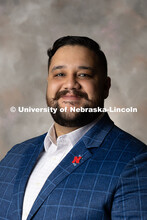 Studio portrait of Sergio Ceja, Assistant Director of Development at the University of Nebraska Foun