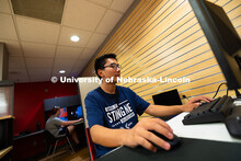 Tony Wang (right) and Westleigh Santema team up to play StarCraft against Devin Eno and his father, 