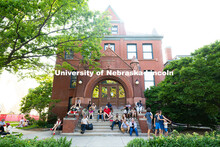 Jazz in June fans gather on the shaded steps of Architecture Hall on Tuesday, June 10. 