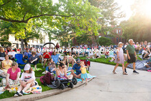 Groups of friends and families fill the lawn to the west of the Sheldon Art Museum during Jazz in Ju