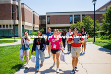 Gideon Casimiro (far right), a junior political science major and NSE Leader, directs the incoming H