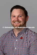 Studio portrait of Adam Christiansen, Academic Navigator for Undergraduate Education and Student Suc