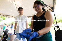 Elizabeth Chhoeung holds Mr. Tubby, a Madagascar hissing cockroach. It's not something she would nor