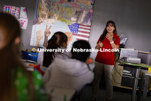 Zahraa Rida speaks to a classroom of immigrants and refugees at the Center for People about healthy 