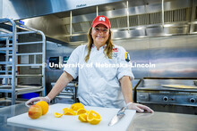 Paige Knebel poses in the Willa Cather Dining Hall. Knebel is the ‘Chef de Cuisine’ for UNL. Her