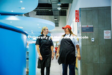 Victoria Dodd (left), the Assistant Food Service Manager, speaks with Paige Knebel, the Chef de Cuis