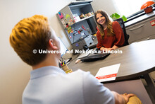 Meredith Cain, Academic Navigator for the College of Arts and Sciences, listens to Jack Hibbs, a sen