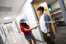 Sara Troupe shakes hands with Nyssa Fernandez, a sophomore studying Film, Emerging Media Arts and En