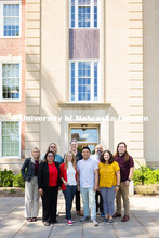 The Center for Academic Success and Transition team pose for a group photo outside of Love Library S