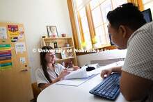 Donny Bui, an academic success coach in the Center for Academic Success and Transition, meets with K