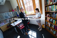 Robert Russell, director of the Center for Academic Success and Transition, chats with Kyanne Casper