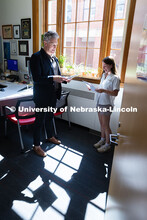 Robert Russell, director of the Center for Academic Success and Transition, chats with Kyanne Casper