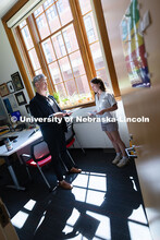 Robert Russell, director of the Center for Academic Success and Transition, chats with Kyanne Casper
