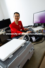 Qiang Liu, assistant professor in the School of Computing, is pictured in his office in Avery Hall. 