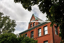 Architecture hall framed by trees. Summer on City Campus. July 16, 2025. 