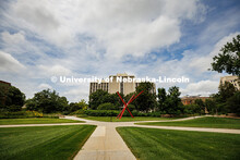Five sidewalks intersect near the Old Glory sculpture on City Campus in the summertime. Summer on Ci