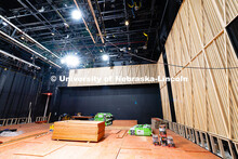 Wood and fabric panels line the walls of what will be an interactive performance space in the new wi
